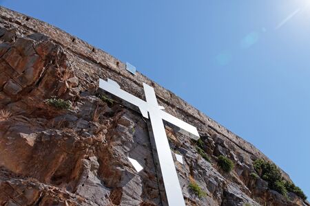 cross on the cliff day in the summerの写真素材