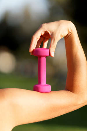 Hand with dumbbells athletic fitnessの写真素材