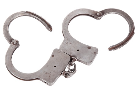 handcuffs closeup, isolated backgroundの写真素材