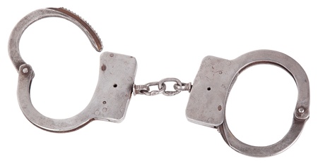 handcuffs closeup, isolated backgroundの写真素材