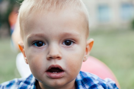 portrait of a child outside in the summerの写真素材