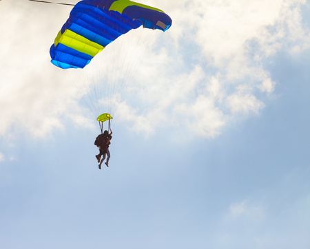 skydiver flying against the skyの写真素材