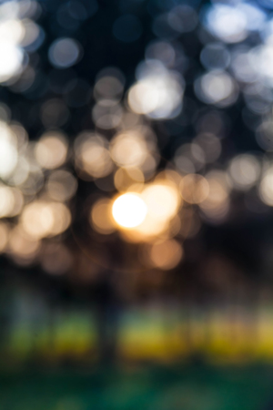 bokeh blurred evening light circlesの写真素材