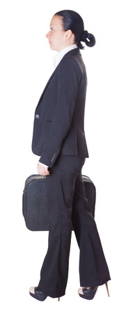 business woman with a suitcase, isolated white の写真素材