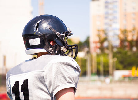 a man dressed in uniforms football playerの写真素材