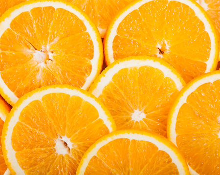 fruit background of ripe juicy orange slices