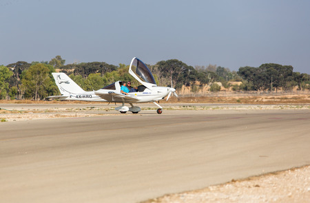 sitting two people in a small private plane