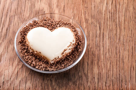 jelly in the form of heart on wooden backgroundの写真素材