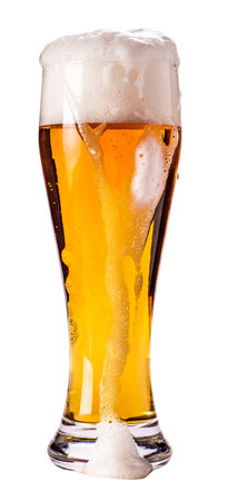 full glass of light beer isolated on a white backgroundの写真素材