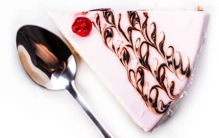 vanilla piece of cake closeup on a white backgroundの写真素材