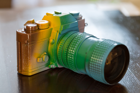 colorful vintage camera close-up on a dark backgroundの写真素材
