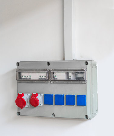electrical switch on the white  wall closeup