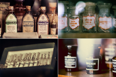 vintage medications in small bottles on a shelfの写真素材