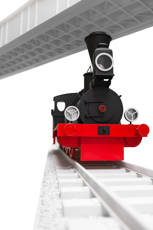 black vintage toy train on the tracksの写真素材