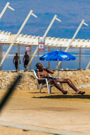 People relax on the beach Dead Seaのeditorial素材