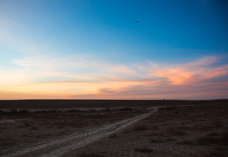 sky sunrise or sunset, desert landscapeの写真素材