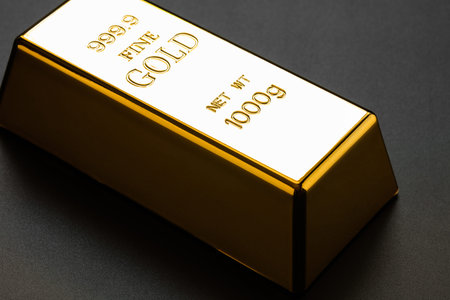 closeup of gold bullion on a dark background