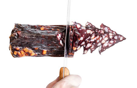 jerked sausage slices isolated on white backgroundの写真素材