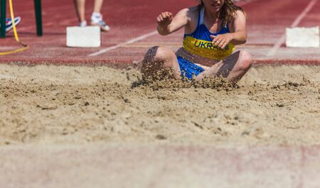 landing in long jump in track and fieldの写真素材