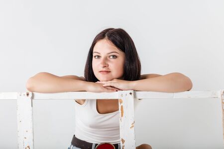 portrait of a teenage girl on light backgroundの写真素材