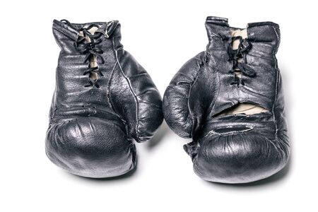 old boxing gloves on a white background isolatedの写真素材