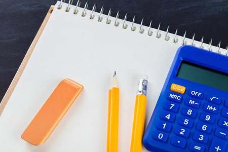 calculator and Office supplies on black backgroundの写真素材