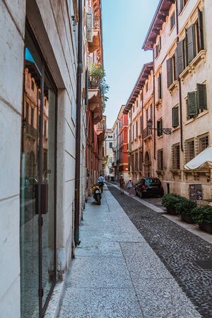 the ancient are narrow street in Italyの写真素材