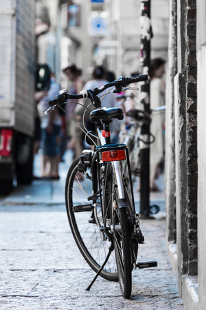 bicycle closeup standing on the old street in Italyの写真素材
