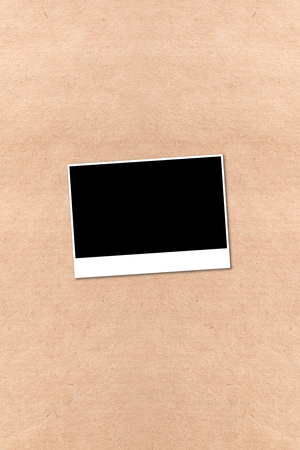 empty photographs on a background beige paper textureの写真素材