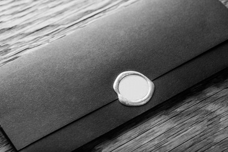 envelope with stamp on the wooden tableの写真素材