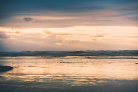 the landscape sea waves on sunset backgroundの写真素材