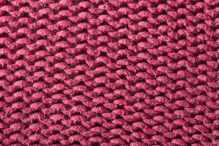 the abstract background texture of a knitted fabricの写真素材
