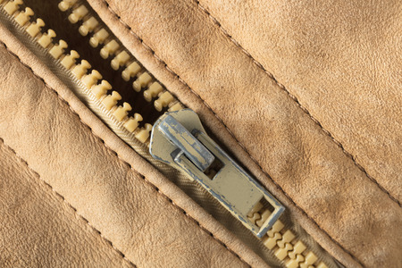abstract background texture of leather and zipperの写真素材