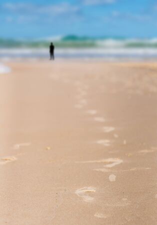 landscape Mediterranean Sea, footprints in the sandの写真素材