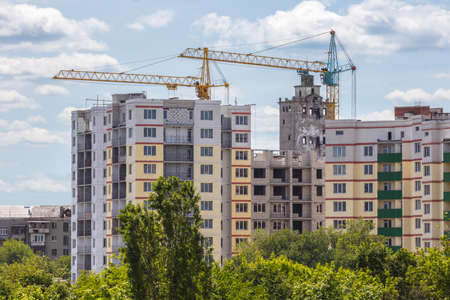 Industrial landscape, construction of high-rise buildings and cranesのeditorial素材