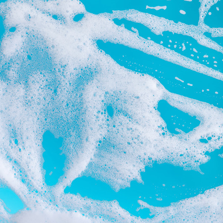 abstract background, soap foam on a blue backgroundの写真素材