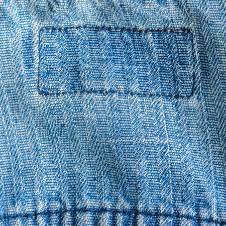 abstract background texture of denim cloth close-upの写真素材