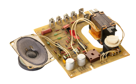 disassembled electronic speaker on white isolated backgroundの写真素材