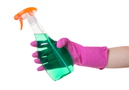 detergent with sprayer in hand on white isolated backgroundの写真素材