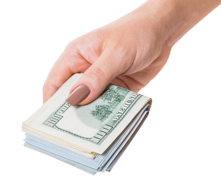 paper money in hand on white isolated backgroundの写真素材