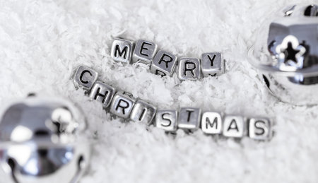 festive background, inscription on the snow merry christmas