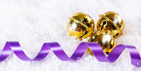 Christmas bells in the snow, festive backgroundの写真素材