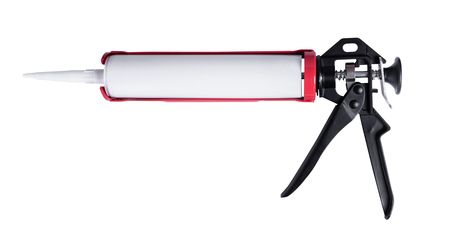 working tool pistol with silicone tube on white isolated backgroundの写真素材