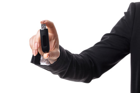 flash card in female hand on white isolated background