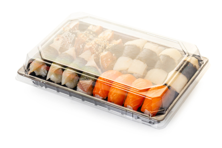 sushi set in a package on white isolated backgroundの写真素材