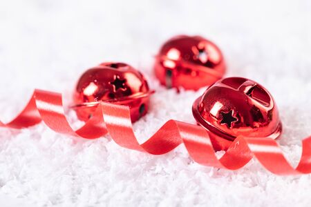 Christmas bells in the snow, festive backgroundの写真素材