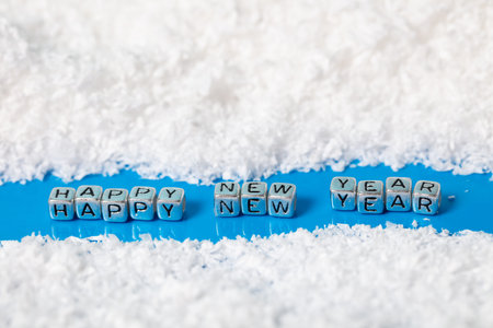 festive background, inscription on the snow Happy new year