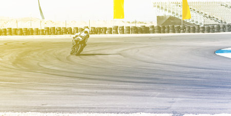 competition, motorcycle racer rides on a sports track