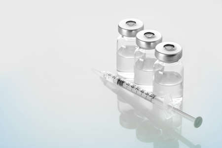 syringe and medicine bottle for injection, Influenza vaccine conceptの写真素材