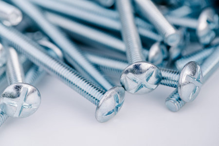 background of new bolts and nuts close-up